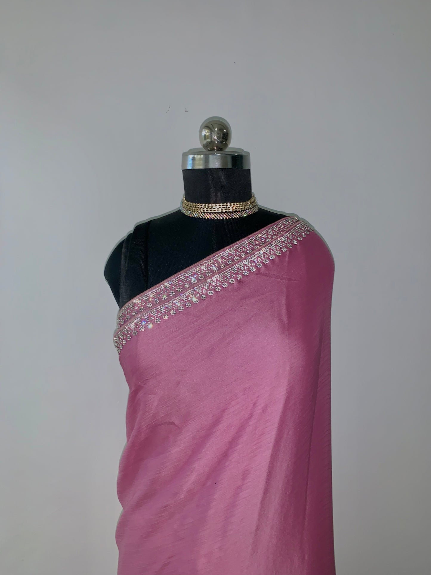 Onion Pink Textured Satin Saree With Stone Work And Unstitched Blouse Fabric