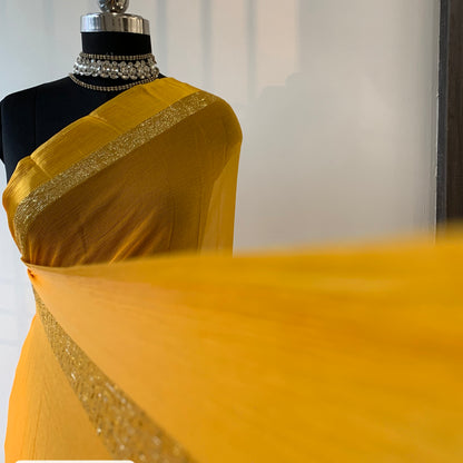 Yellow chiffon saree with resham embroidery
