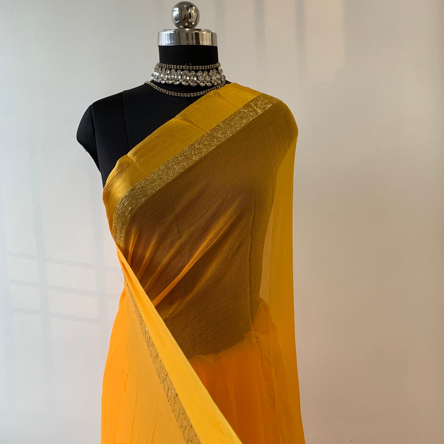 Yellow chiffon saree with resham embroidery