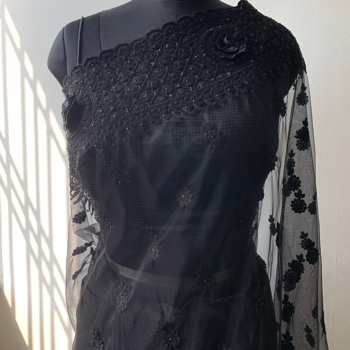 Black Net Saree With Floral Threadwork And Unstitched Blouse Piece