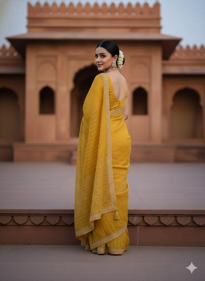 Radiant Marigold Georgette Saree with Allover Crystal Work